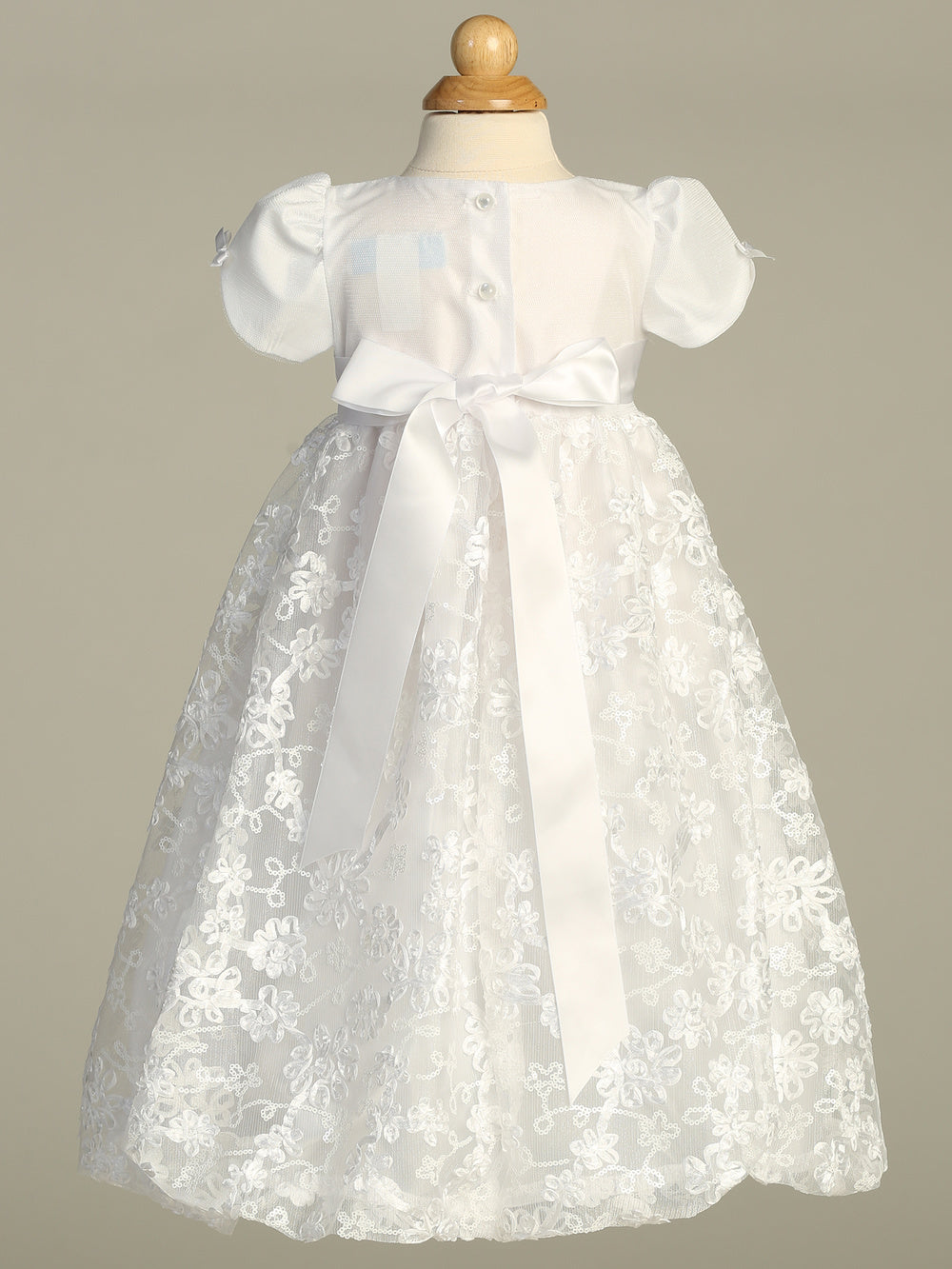 <strong>Girls Baptism Gown With Sequined Ribbon Skirt</strong> Gown with sequined ribbon skirt is a darling gown for Baptism or Christening.
